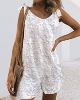 Avslappnad jumpsuit med spetsrem